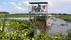 Mechanical harvester operating on water