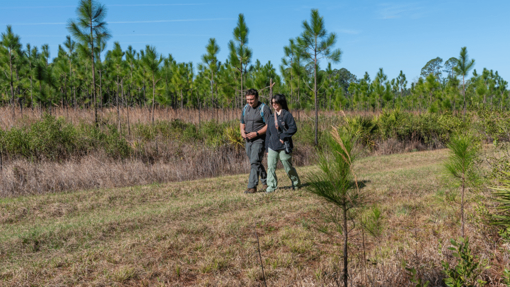 two people hiking the rice creek property