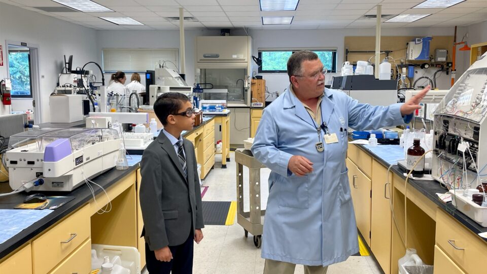 Lucas Rivera, a student at Galileo School for Gifted Learning, visits the St. Johns River Water Management District lab to learn about water quality testing. Rivera also attended the District’s Governing Board meeting to thank members for funding the Blue School Grant Program.