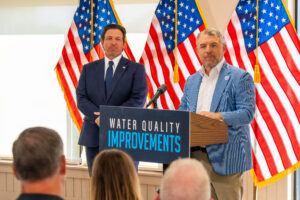 Rob Bradley speaking to the public with Florida Governor Ron DeSantis