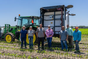 Members of the Districts Agricultural Assistance Team attending a demonstration of high precision crop spraying equipment (Ecorobotix) at Sykes Family Farms in Elkton, FL - In attendance: Suzanne Archer, Wayne Boykin, Corinne Hermle (Strategic Planning Basin Coordinator)