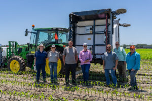 Members of the Districts Agricultural Assistance Team attending a demonstration of high precision crop spraying equipment (Ecorobotix) at Sykes Family Farms in Elkton, FL - In attendance: Suzanne Archer, Wayne Boykin, Corinne Hermle (Strategic Planning Basin Coordinator)