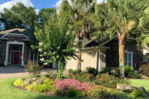 water less landscape house with floral landscape