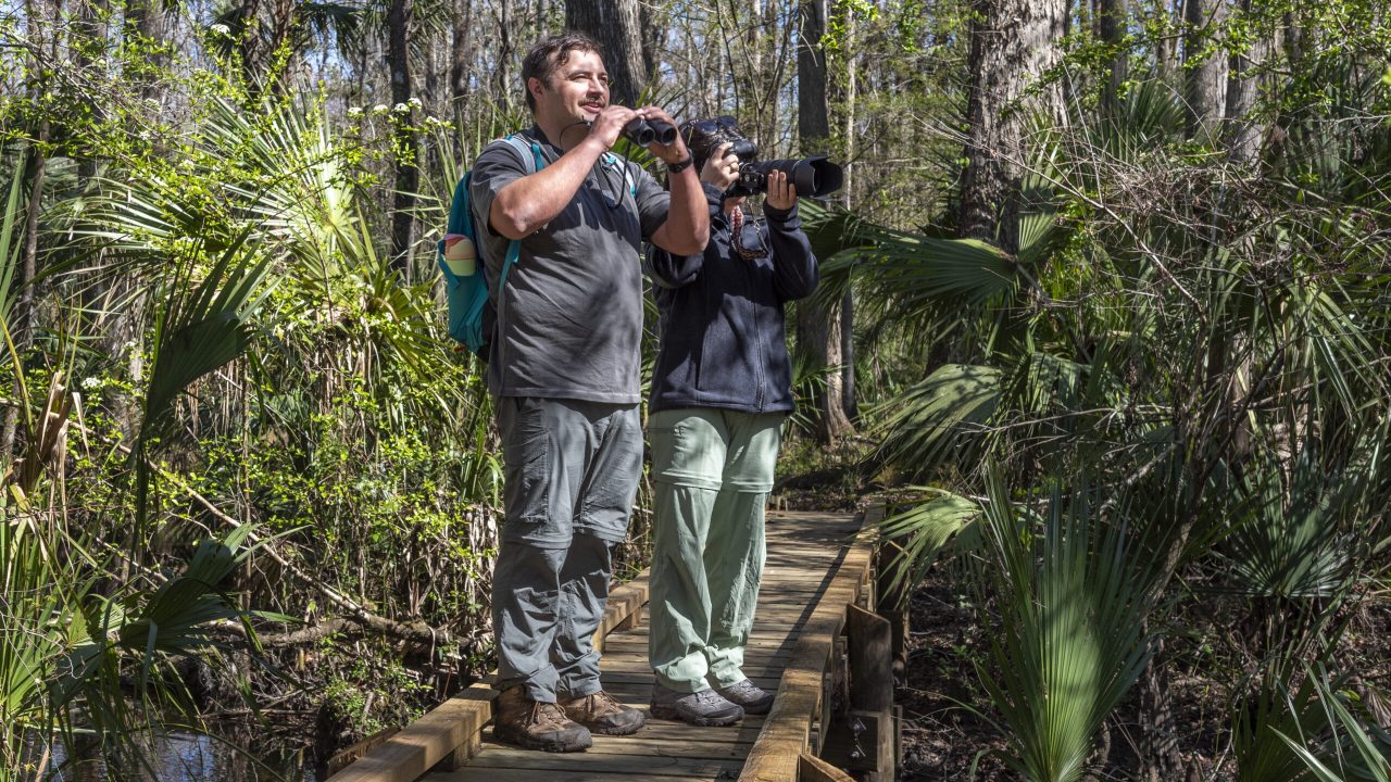 Cayla Romano-Freeman and Russel Freeman hiking at Rice Creek Conservation Area