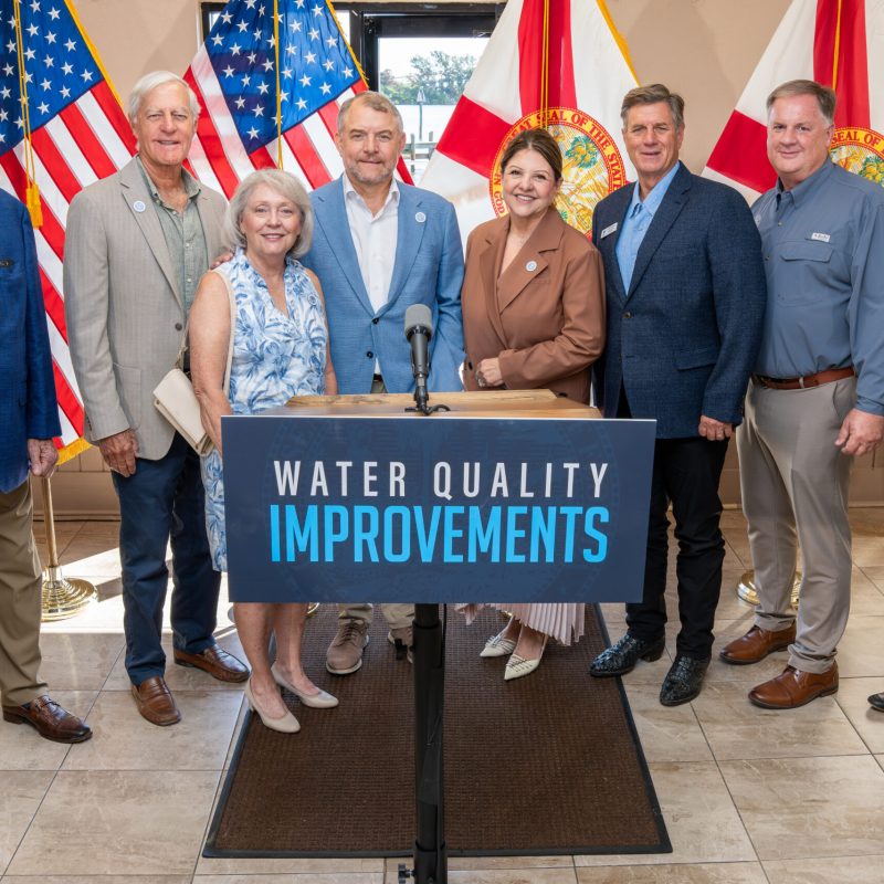 St. Johns River Water Management District Governing Board members (Douglas Burnett, Doug Bournique, Janet Price, Rob Bradley,Maryam H. Ghyabi-White, J. Chris Peterson, Cole Oliver) with Exectutive Director Mike Register