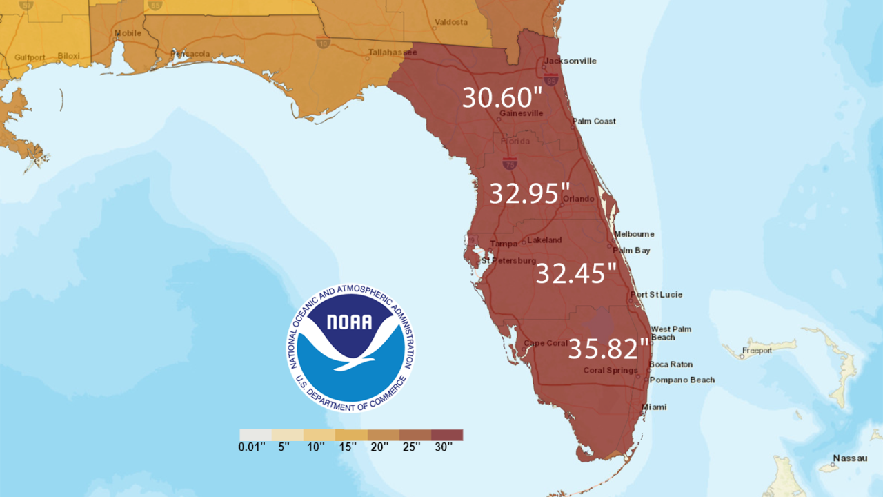 NOAA rainfall map showing estimated storm totals across Florida and the eastern Gulf Coast, with the state shaded in deep red and labeled rainfall amounts from about 30 to 36 inches, plus a color scale bar and NOAA logo indicating extreme precipitation over the peninsula and nearby coastal areas.